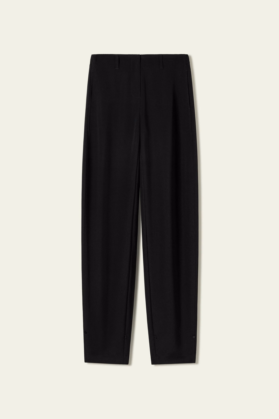 Pantaloni in crêpe di seta con cucitura curva