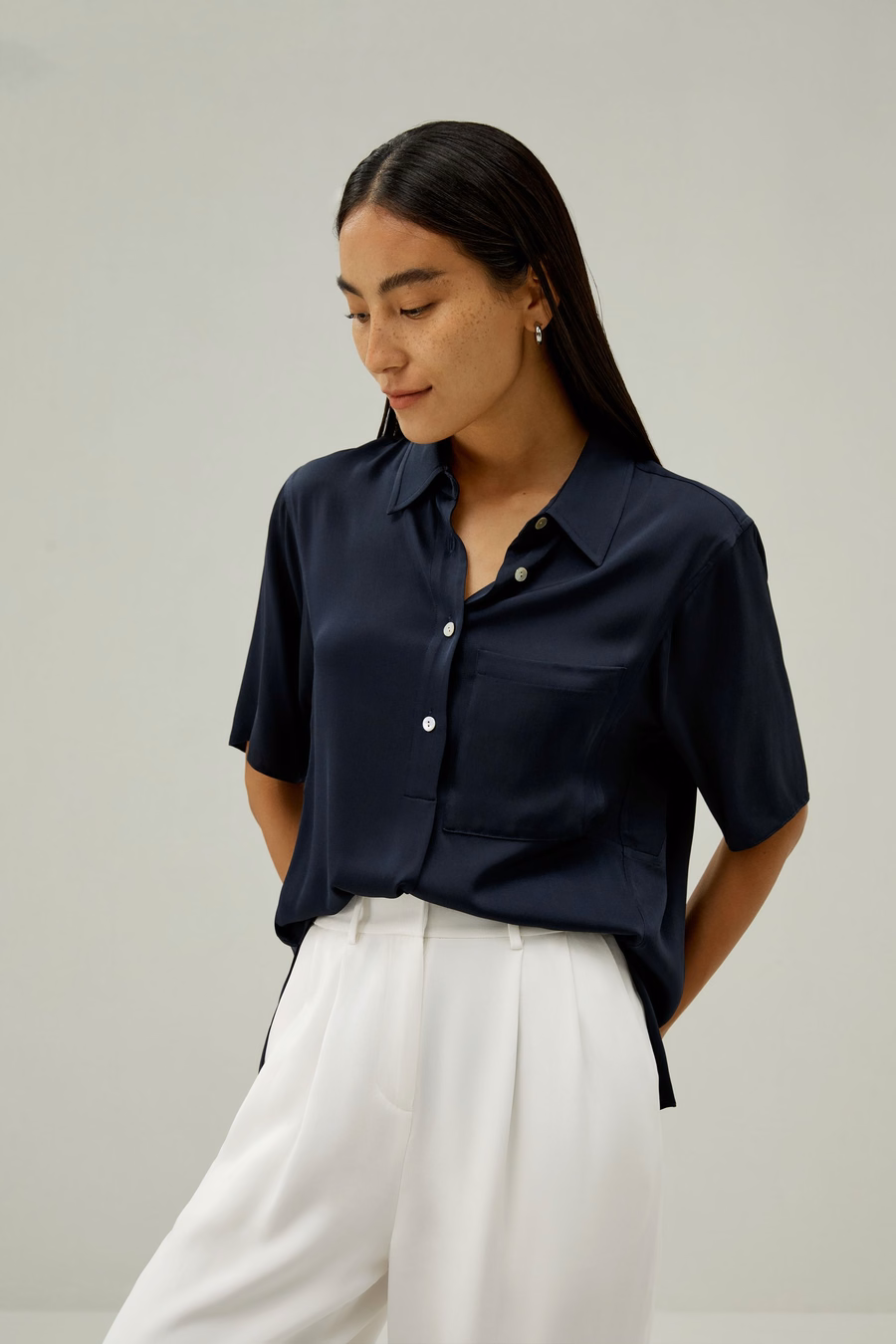Camicia a maniche corte con bottoni a mezza placca