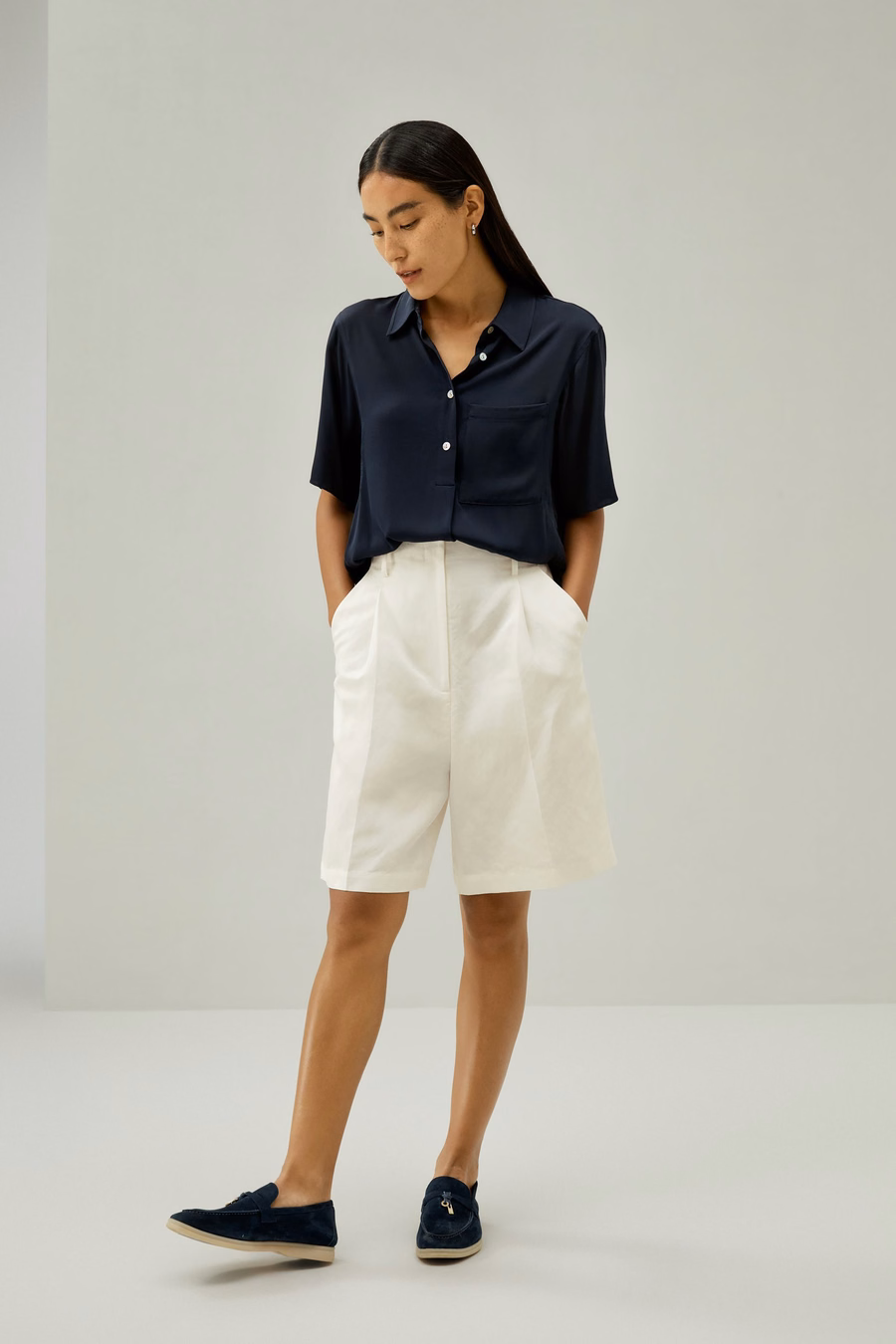 Camicia a maniche corte con bottoni a mezza placca