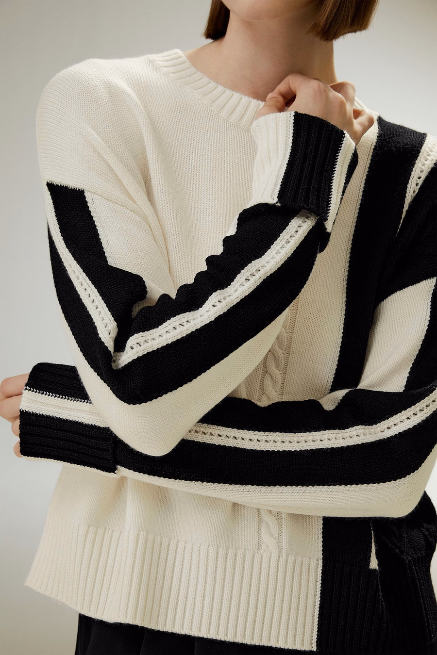 Maglione in lana a righe bicolor