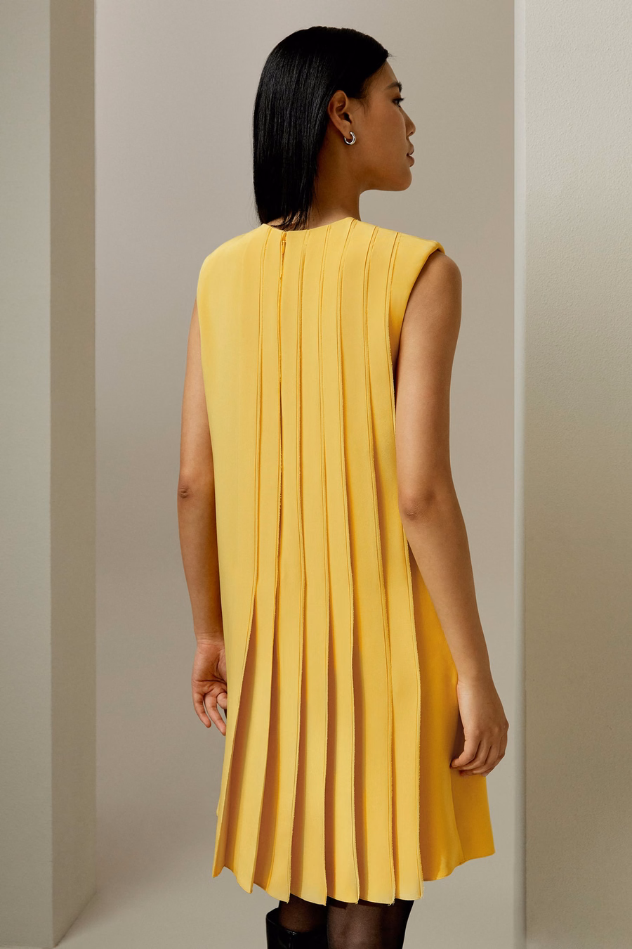 Sleeveless accordion pleated silk dress