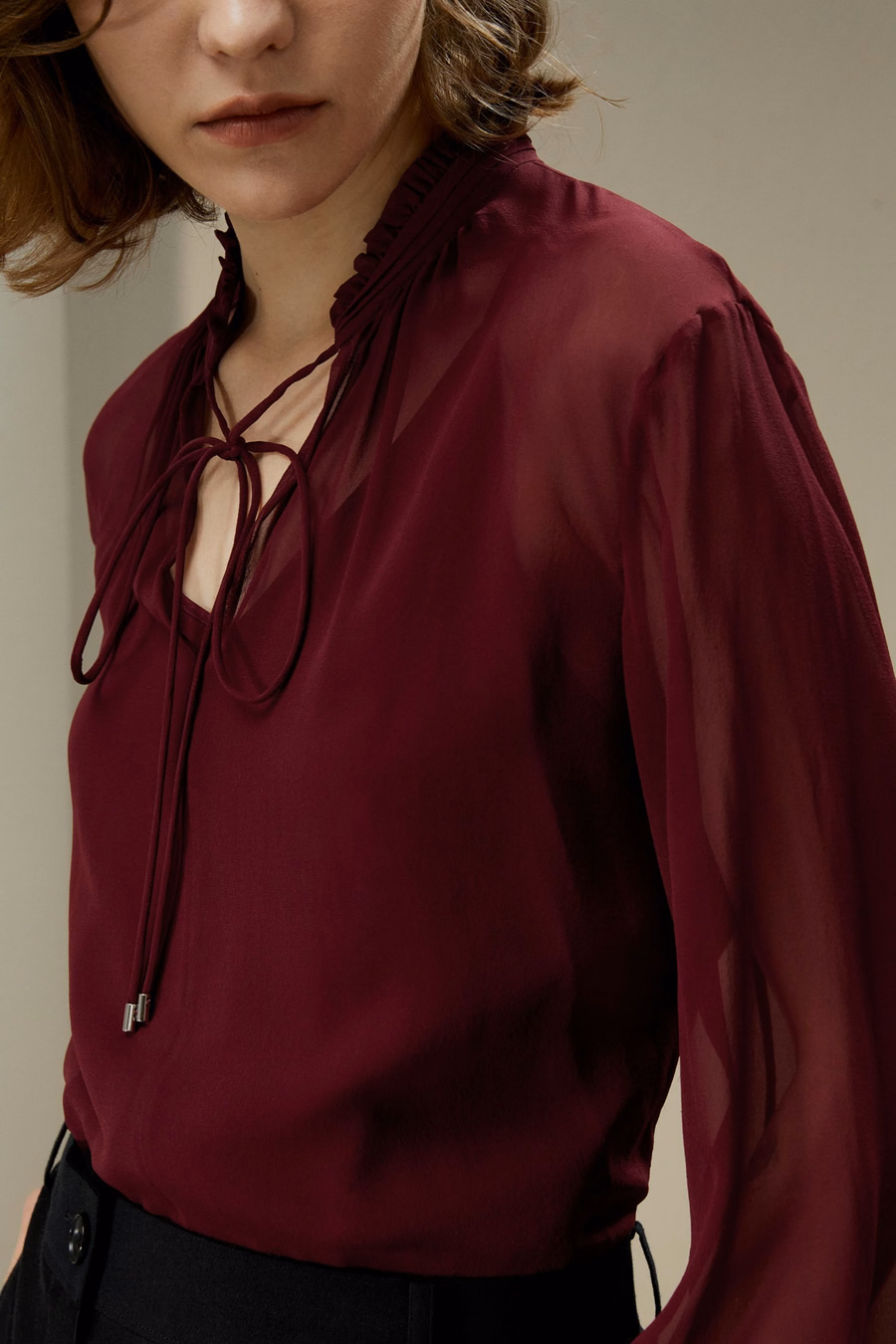 Blusa in georgette con lacci davanti